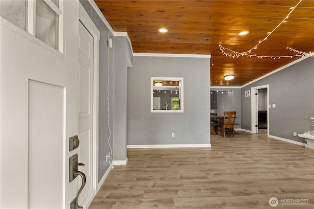 12027 78th Ave S, Seattle, WA 98178 - foyer featuring wooden ceiling, ornamental molding, wood finished floors, and recessed lighting