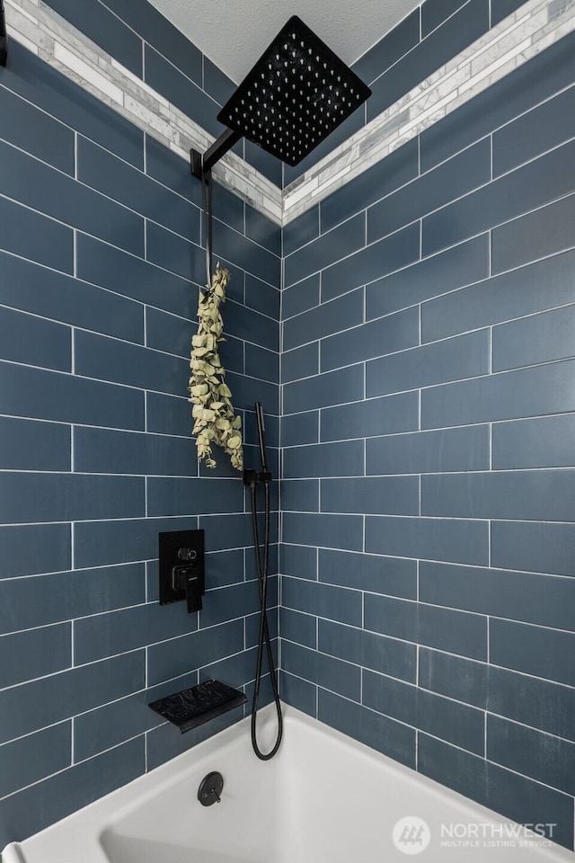2033 E Wright Ave, Tacoma, WA 98404 - bathroom featuring bathing tub / shower combination