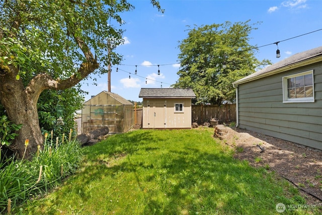 2033 E Wright Ave, Tacoma, WA 98404 - fenced backyard with a greenhouse and a storage shed