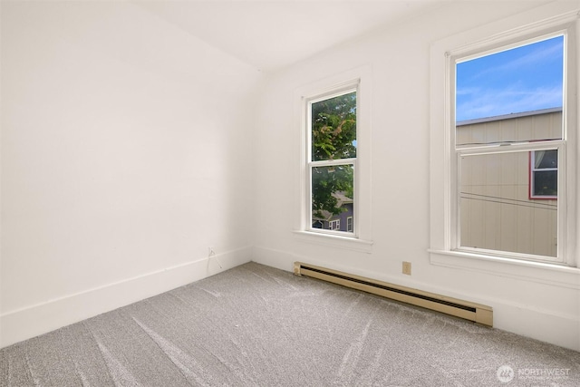 1609 F St, Bellingham, WA 98225 - carpeted empty room with a baseboard radiator