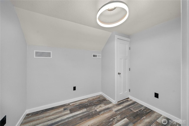 4415 Waller Rd E, Tacoma, WA 98443 - laundry area featuring dark wood-type flooring and baseboards