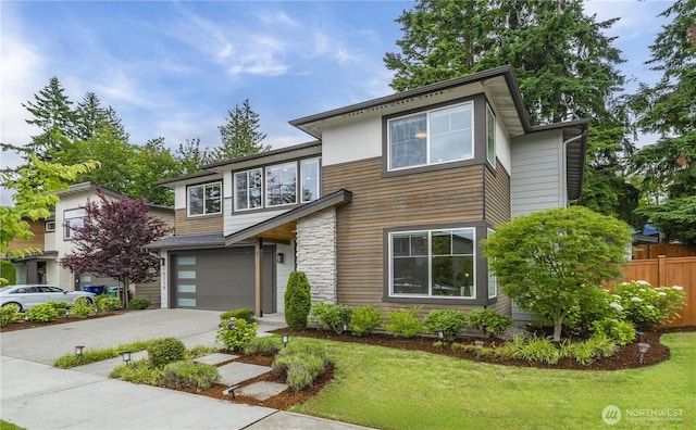 10259 133rd Ct NE, Redmond, WA 98033 - contemporary house with an attached garage, concrete driveway, and stone siding