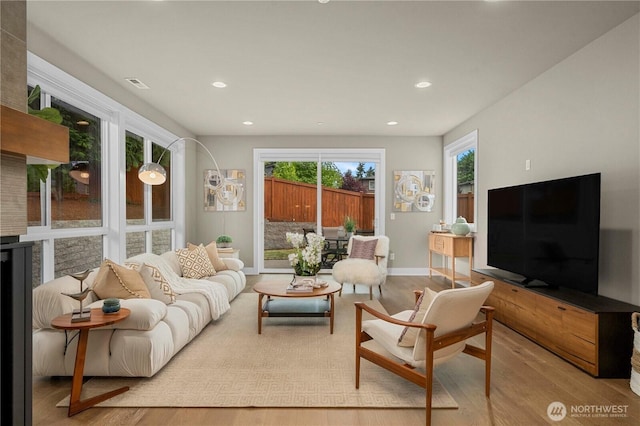 10259 133rd Ct NE, Redmond, WA 98033 - living room featuring wood finished floors and recessed lighting