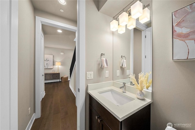 10259 133rd Ct NE, Redmond, WA 98033 - bathroom with vanity, wood finished floors, and recessed lighting