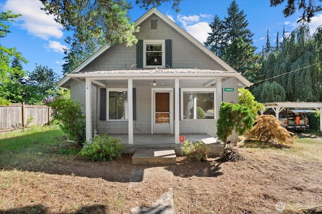 18056 25th Ave NE, Lake Forest Park, WA 98155 - bungalow-style home with a porch and a detached carport