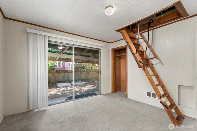 18056 25th Ave NE, Lake Forest Park, WA 98155 - carpeted spare room with crown molding and stairway
