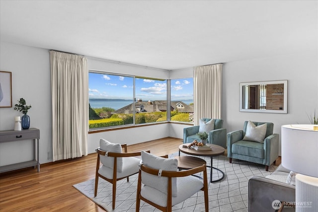 731 Melody Ln, Edmonds, WA 98020 - living area with light wood-style floors and a water view