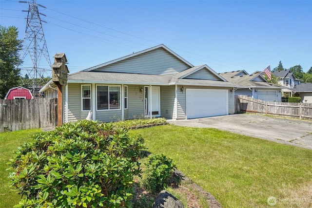 87 Chickadee Dr, Kelso, WA 98626 - view of front of house with a garage, covered porch, driveway, and roof with shingles