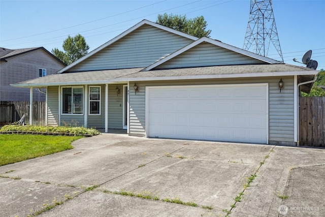 87 Chickadee Dr, Kelso, WA 98626 - single story home featuring roof with shingles, a porch, concrete driveway, and an attached garage