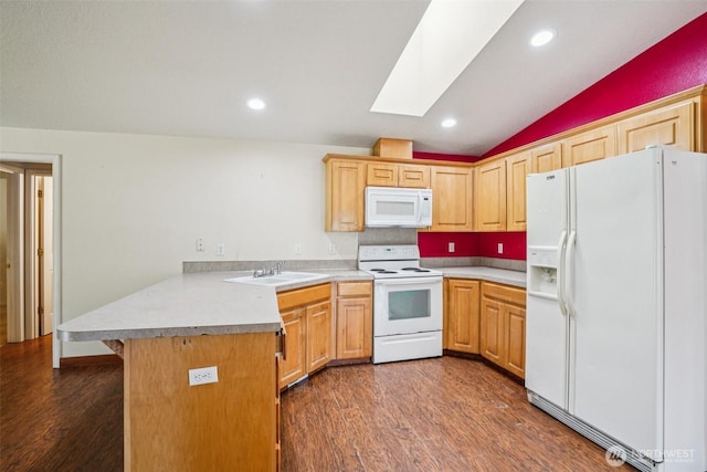 87 Chickadee Dr, Kelso, WA 98626 - kitchen featuring white appliances, a peninsula, vaulted ceiling, a skylight, and dark wood-style floors