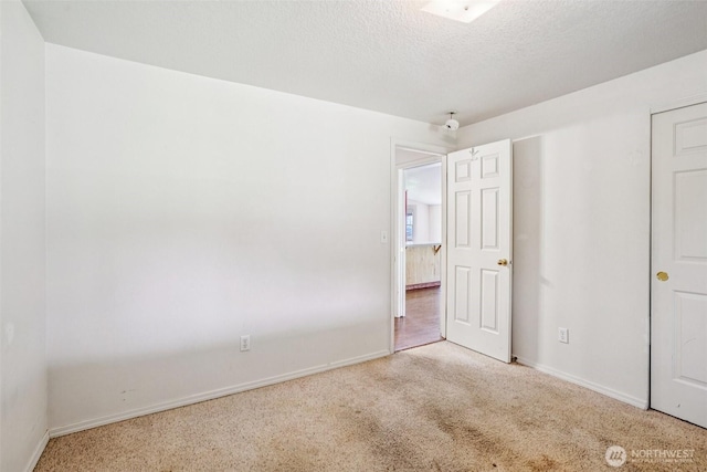 87 Chickadee Dr, Kelso, WA 98626 - unfurnished bedroom with carpet floors and a textured ceiling