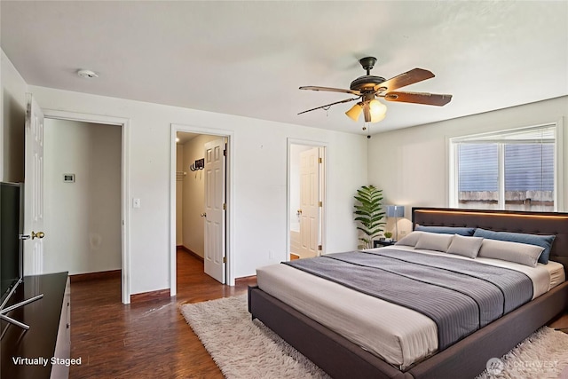 87 Chickadee Dr, Kelso, WA 98626 - bedroom with dark wood-style flooring, a ceiling fan, and connected bathroom