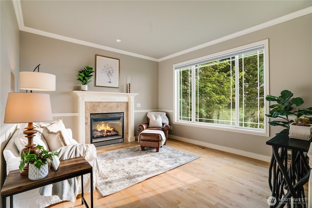 1425 S Sunset Dr, Tacoma, WA 98465 - living area featuring a fireplace, light wood finished floors, crown molding, and recessed lighting
