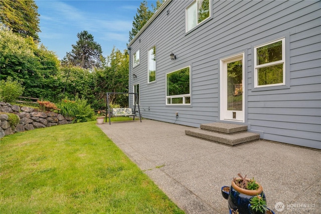 1425 S Sunset Dr, Tacoma, WA 98465 - back of property with a patio area and a yard