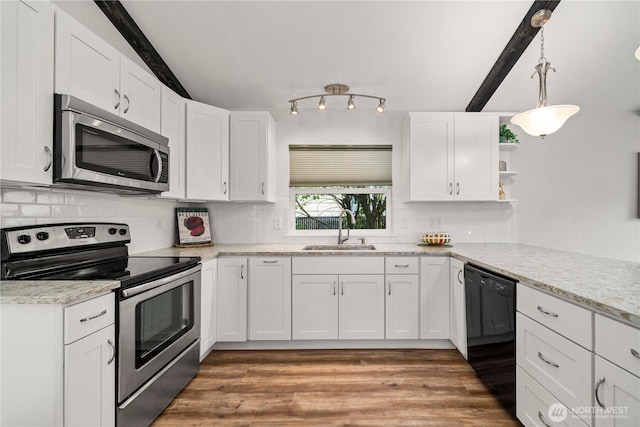 4209 S 297th Pl, Auburn, WA 98001 - kitchen featuring stainless steel appliances, white cabinets, light wood-type flooring, and open shelves