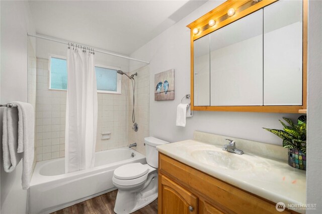 4209 S 297th Pl, Auburn, WA 98001 - full bath featuring wood finished floors, shower / tub combo, and vanity