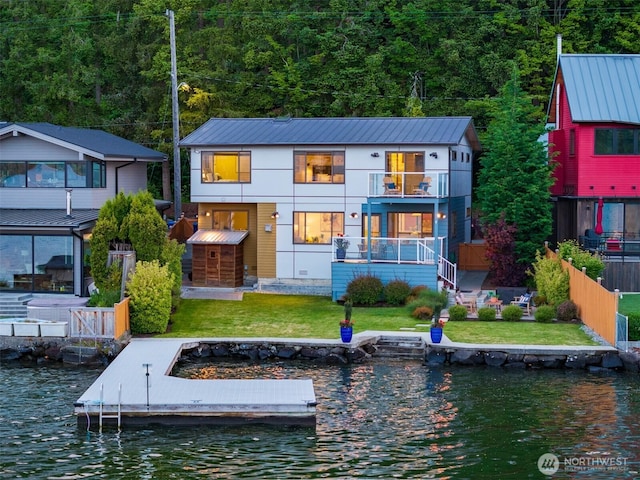 13190 Riviera Pl NE, Seattle, WA 98125 - rear view of property with a balcony, a water view, and a forest view