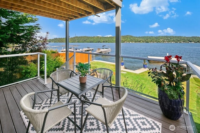 13190 Riviera Pl NE, Seattle, WA 98125 - wooden terrace featuring a water view, a yard, and a boat dock