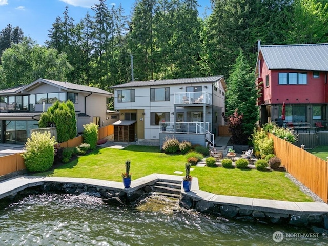 13190 Riviera Pl NE, Seattle, WA 98125 - rear view of property with a balcony and a fenced backyard
