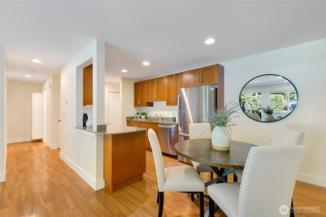 21307 48th Ave W Unit C211, Mountlake Terrace, WA 98043 - dining area with light wood finished floors and recessed lighting