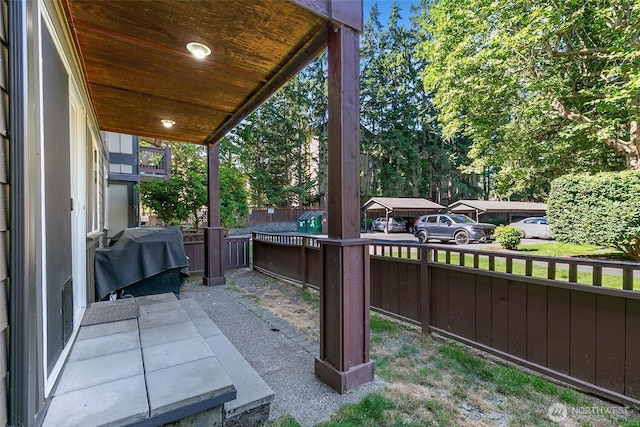 21307 48th Ave W Unit C211, Mountlake Terrace, WA 98043 - view of patio featuring a grill