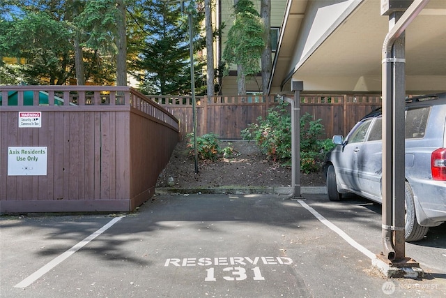 21307 48th Ave W Unit C211, Mountlake Terrace, WA 98043 - view of covered parking lot