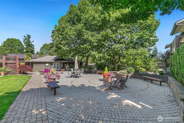 21307 48th Ave W Unit C211, Mountlake Terrace, WA 98043 - view of patio with stairs and outdoor dining area