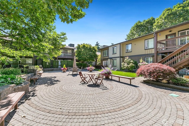 21307 48th Ave W Unit C211, Mountlake Terrace, WA 98043 - view of property's community featuring a patio