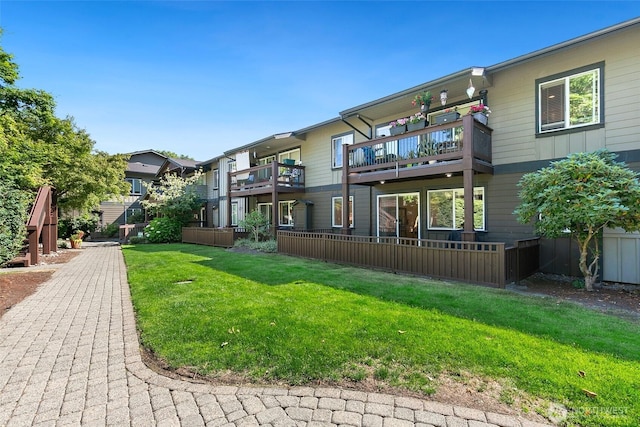 21307 48th Ave W Unit C211, Mountlake Terrace, WA 98043 - view of community featuring a lawn