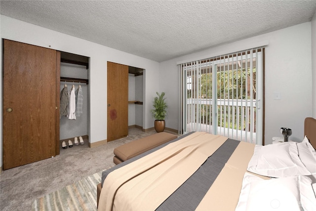 23 S 338th Pl, Federal Way, WA 98003 - carpeted bedroom with multiple closets and a textured ceiling