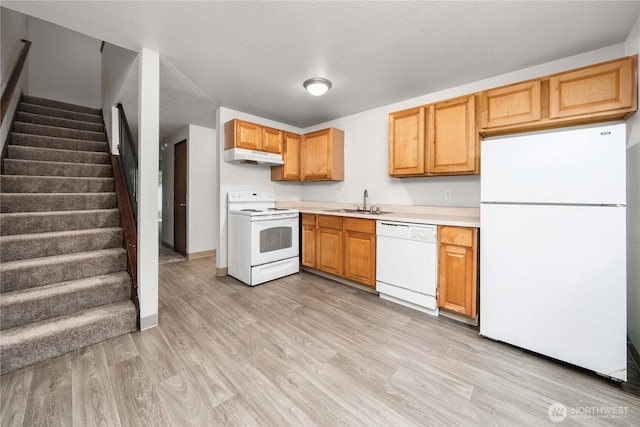 23 S 338th Pl, Federal Way, WA 98003 - kitchen featuring white appliances, light countertops, under cabinet range hood, and light wood-type flooring