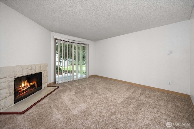 23 S 338th Pl, Federal Way, WA 98003 - unfurnished living room with a fireplace, carpet flooring, and a textured ceiling
