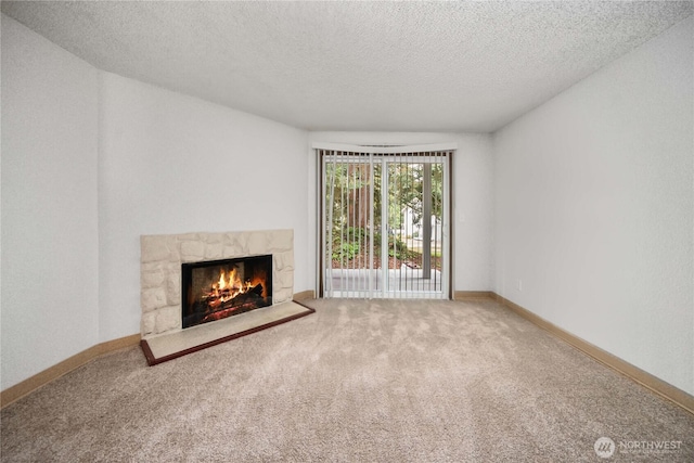 23 S 338th Pl, Federal Way, WA 98003 - unfurnished living room with carpet floors, a fireplace, and a textured ceiling