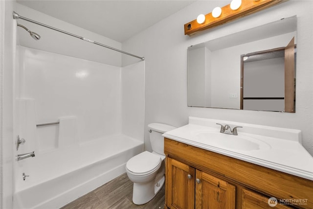 23 S 338th Pl, Federal Way, WA 98003 - full bath with vanity, wood finished floors, and bathtub / shower combination