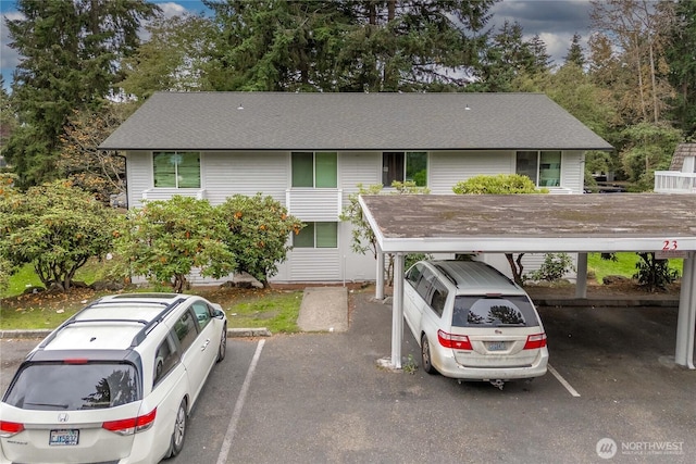 23 S 338th Pl, Federal Way, WA 98003 - townhome / multi-family property with covered and uncovered parking and roof with shingles