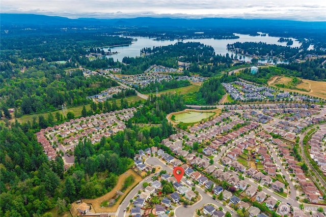 2101 62nd St SE, Auburn, WA 98092 - aerial view of property's location with a nearby body of water and a heavily wooded area