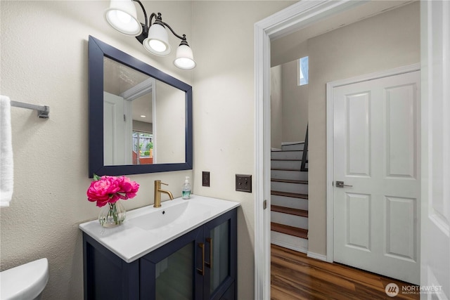 2101 62nd St SE, Auburn, WA 98092 - bathroom featuring vanity, wood finished floors, and plenty of natural light