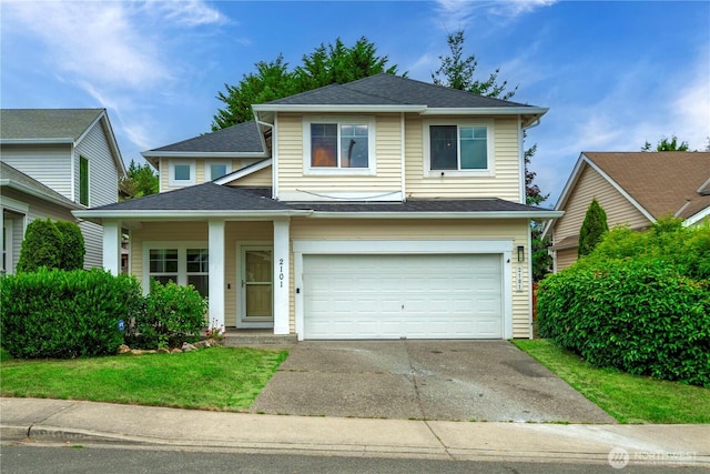 2101 62nd St SE, Auburn, WA 98092 - traditional-style home featuring concrete driveway, a garage, and roof with shingles