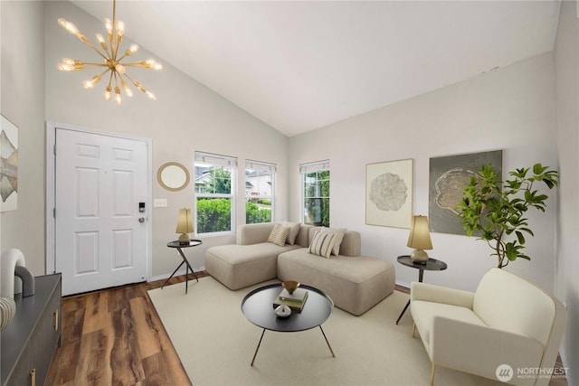 2101 62nd St SE, Auburn, WA 98092 - living area with dark wood finished floors, a chandelier, and high vaulted ceiling