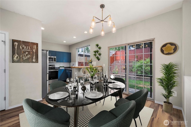 2101 62nd St SE, Auburn, WA 98092 - dining room with a chandelier, wood finished floors, and recessed lighting