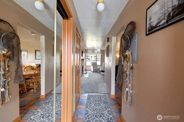 210 26th Street Nw 203&04, Long Beach, WA 98631 - corridor with baseboards