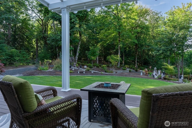 1122 36th Ave NE, Olympia, WA 98506 - wooden deck with an outdoor fire pit and a yard