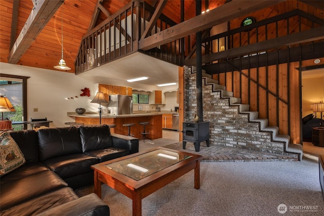 24302 Saddle St, Leavenworth, WA 98826 - living area with a wood ceiling with exposed beams, carpet, high vaulted ceiling, and stairs