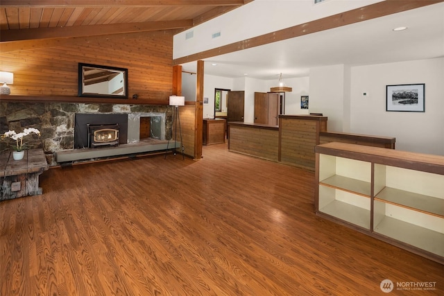 unfurnished living room featuring wood finished floors, wood ceiling, and wood walls