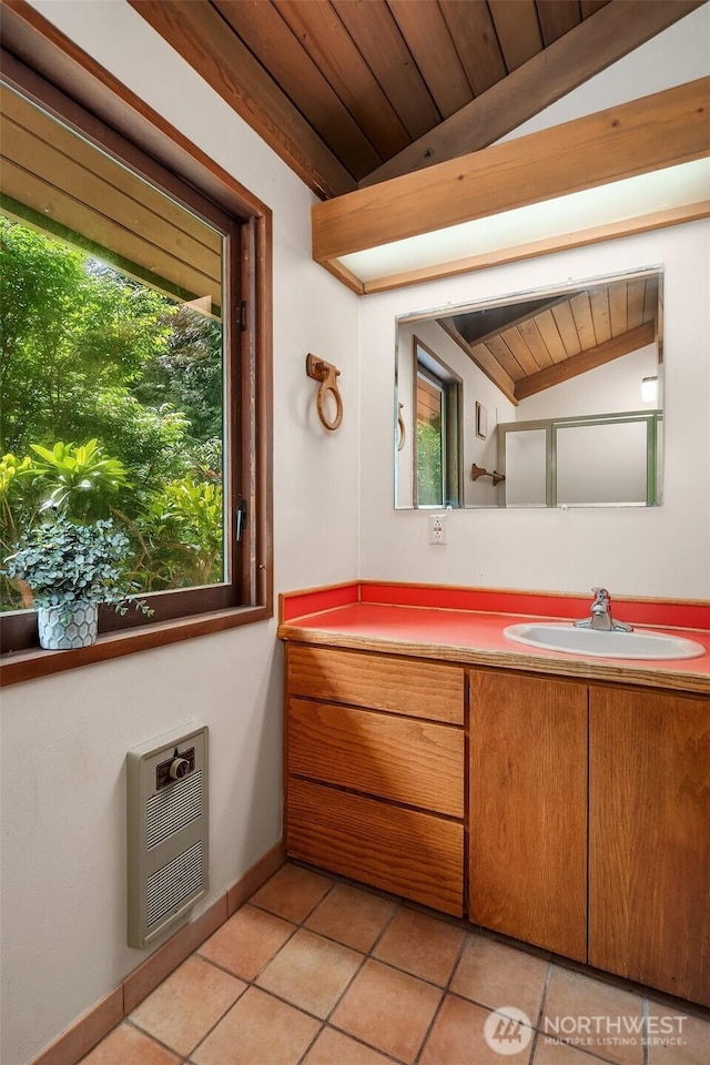 bathroom with heating unit, vanity, wood ceiling, tile patterned flooring, and vaulted ceiling