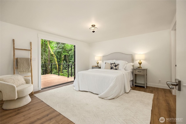 1524 Toe Jam Hill Rd NE, Bainbridge Island, WA 98110 - bedroom with access to exterior and wood finished floors