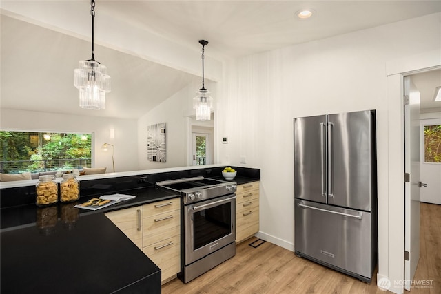 1524 Toe Jam Hill Rd NE, Bainbridge Island, WA 98110 - kitchen featuring stainless steel appliances, dark countertops, vaulted ceiling, light brown cabinets, and light wood-style flooring