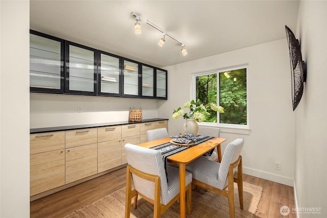 1524 Toe Jam Hill Rd NE, Bainbridge Island, WA 98110 - dining space featuring wood finished floors and track lighting