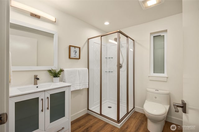1524 Toe Jam Hill Rd NE, Bainbridge Island, WA 98110 - full bath featuring wood finished floors, vanity, a shower stall, and recessed lighting