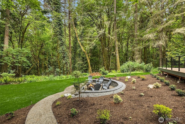 1524 Toe Jam Hill Rd NE, Bainbridge Island, WA 98110 - view of green lawn with a fire pit and a deck